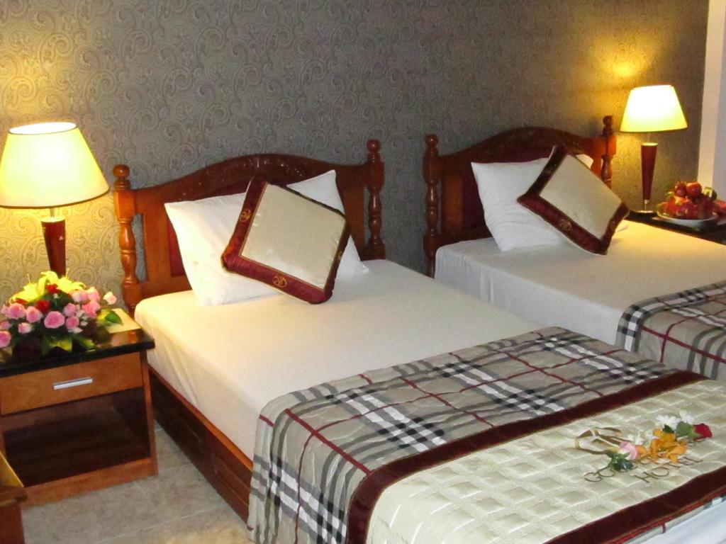 Khach San Trung Mai Hotel Cidade de Ho Chi Minh Quarto foto